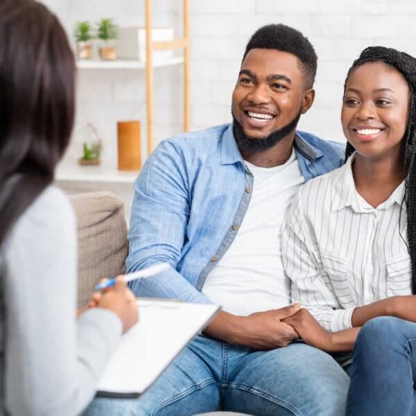 Happy Black Couple with therapist